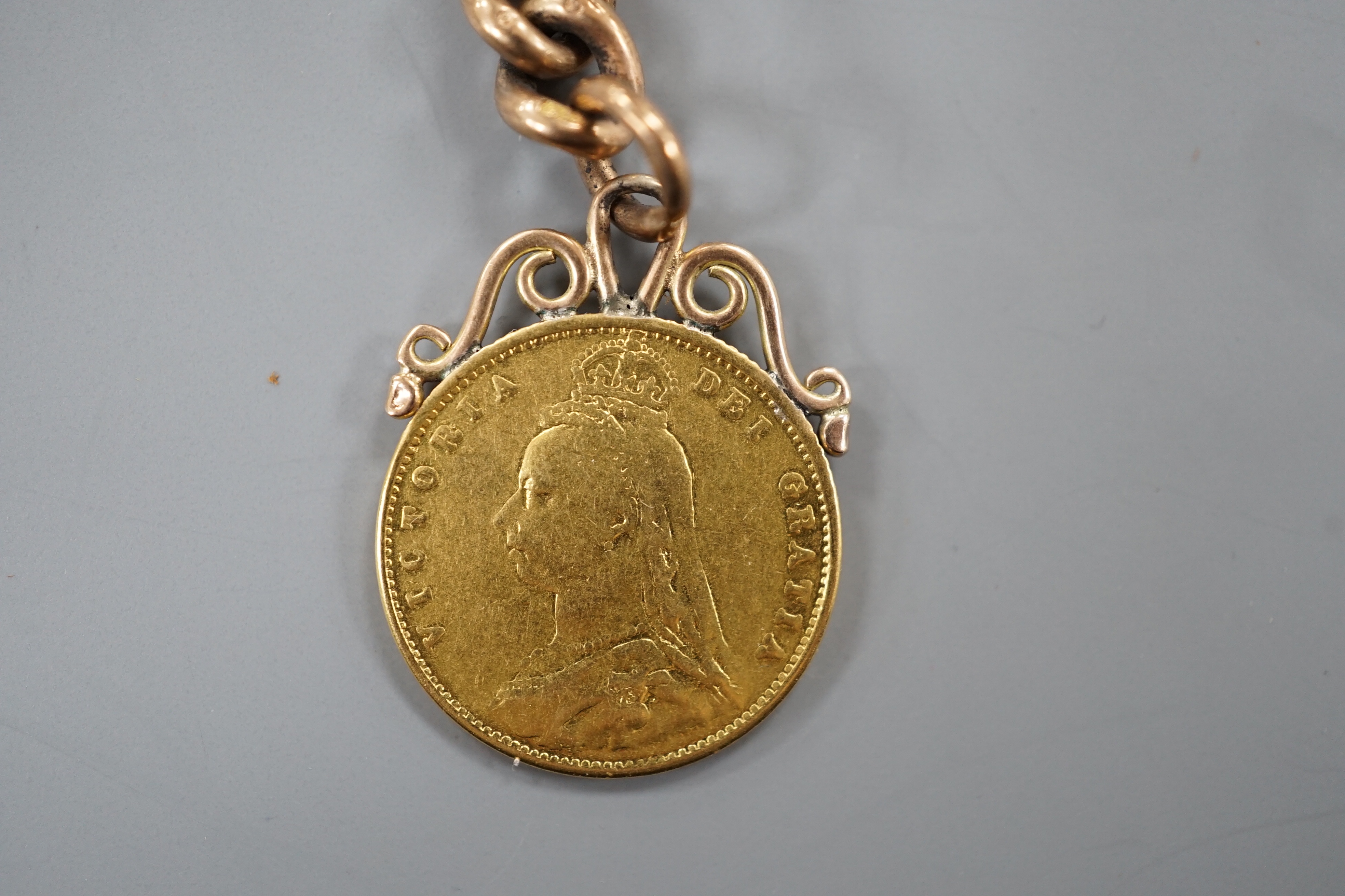 A Victoria 1887 half sovereign, now mounted on a 9ct gold fob with T-bar